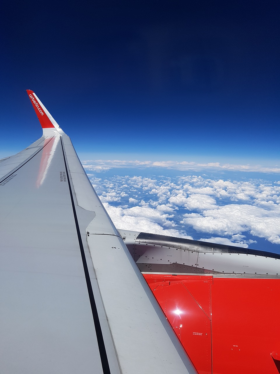 Image - sky clouds flat wing flight