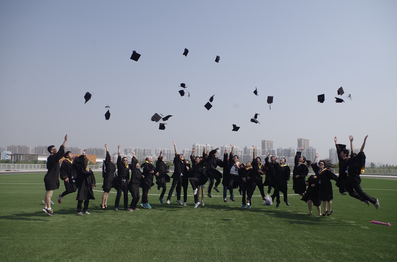 Image - university student graduation jump