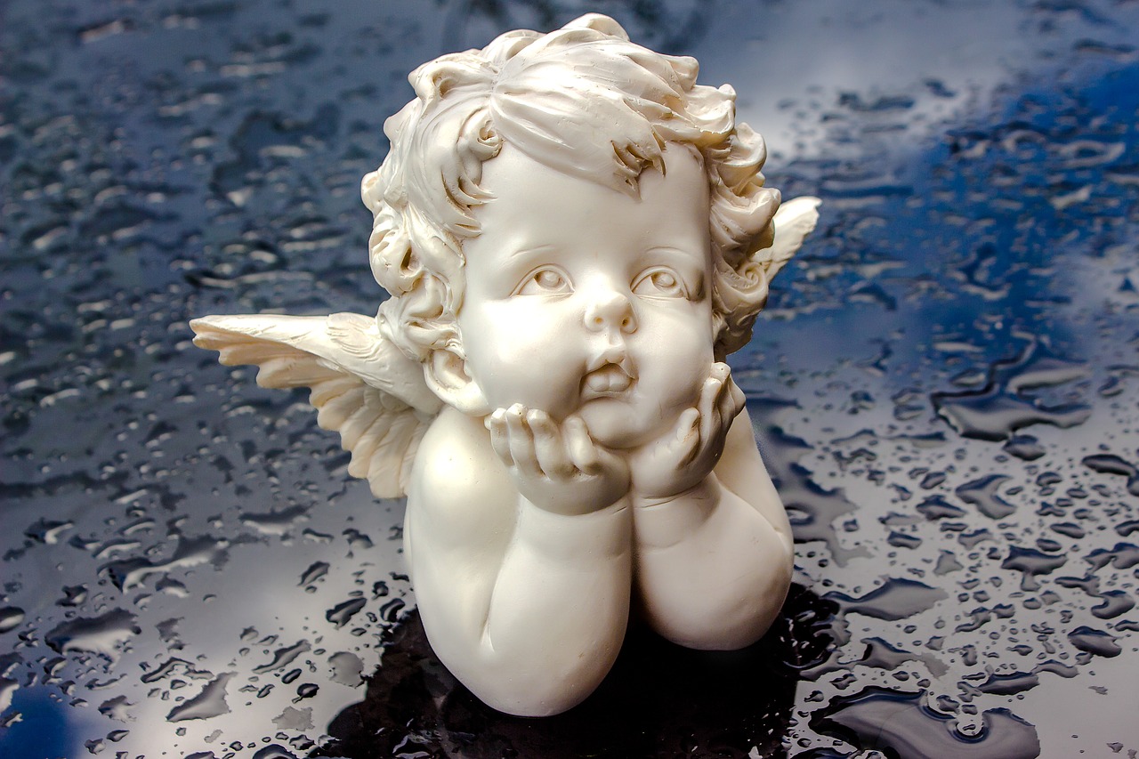 Image - angel figure sitting