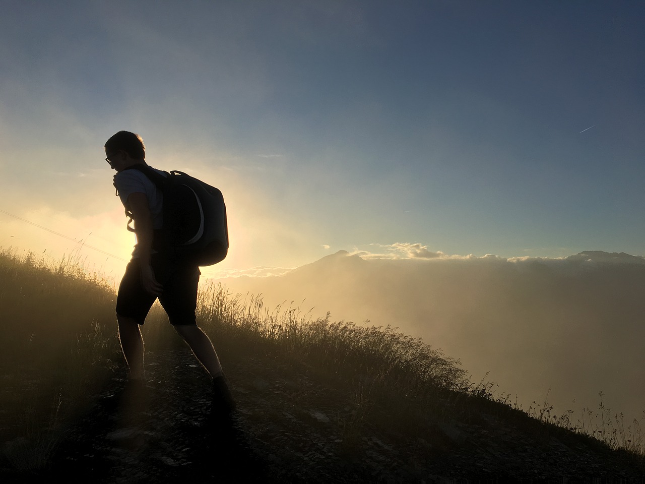 Image - mountain silhouette man drone sun