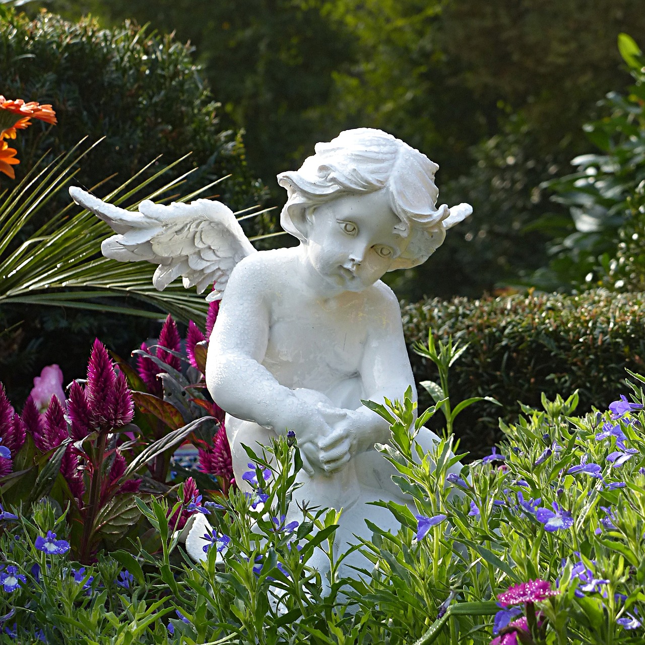 Image - angel figure sitting cemetery