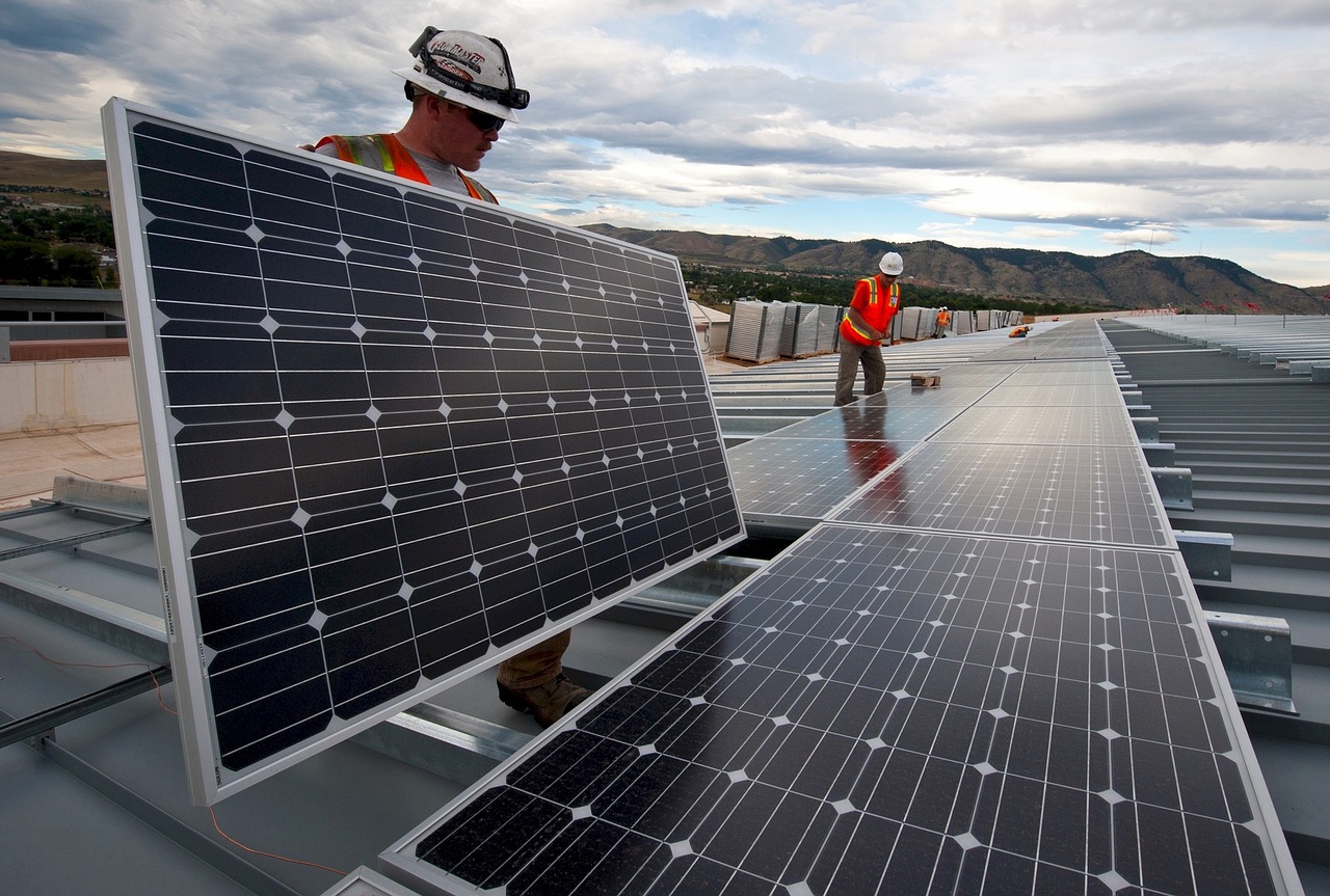 Image - solar panels installation workers