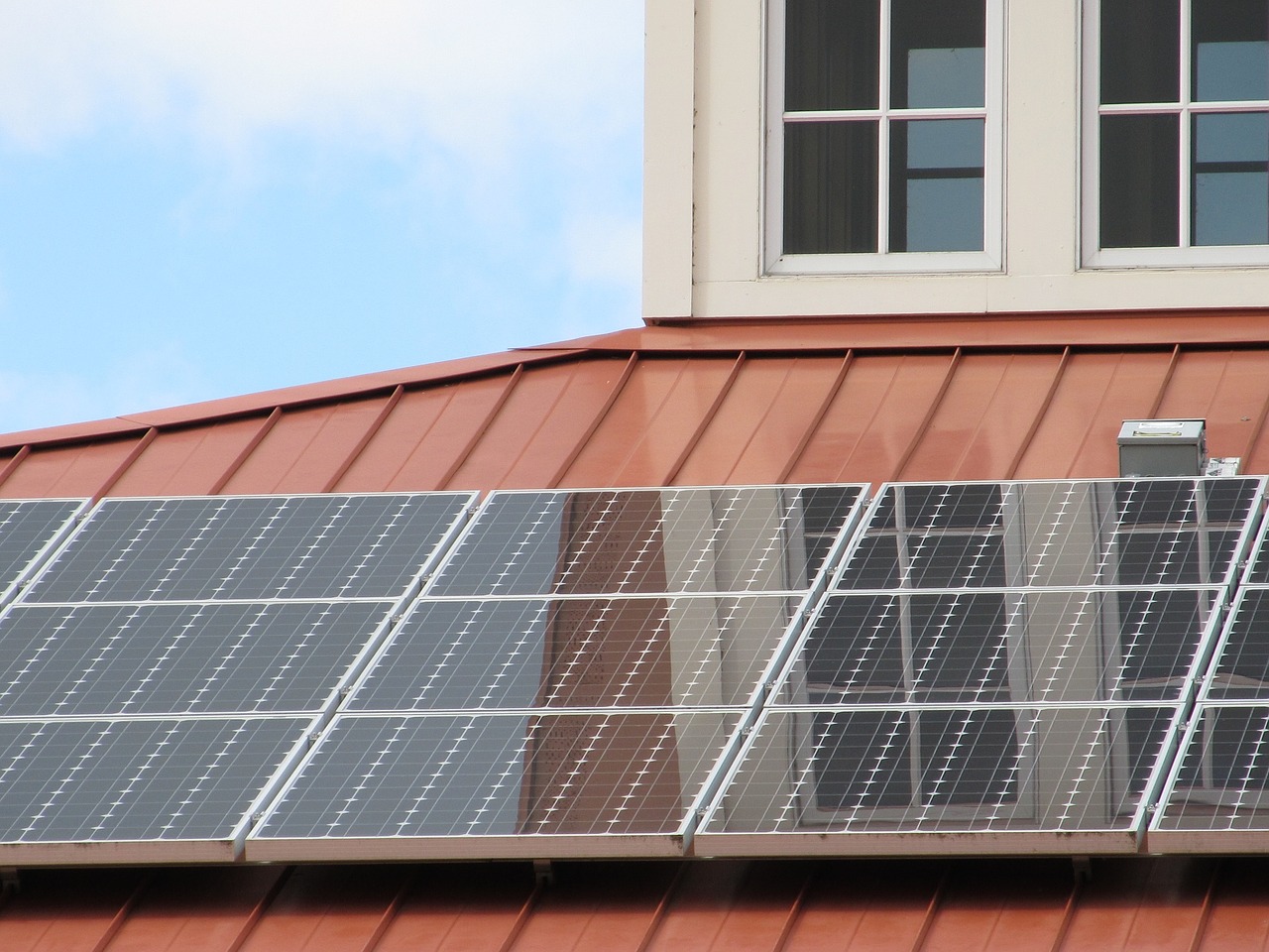 Image - solar panel array roof building