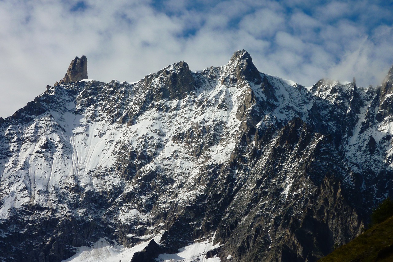 Image - clouds mountain crest snow rock