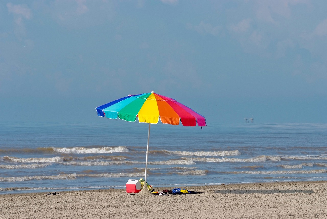 Image - beach sand umbrella colorful