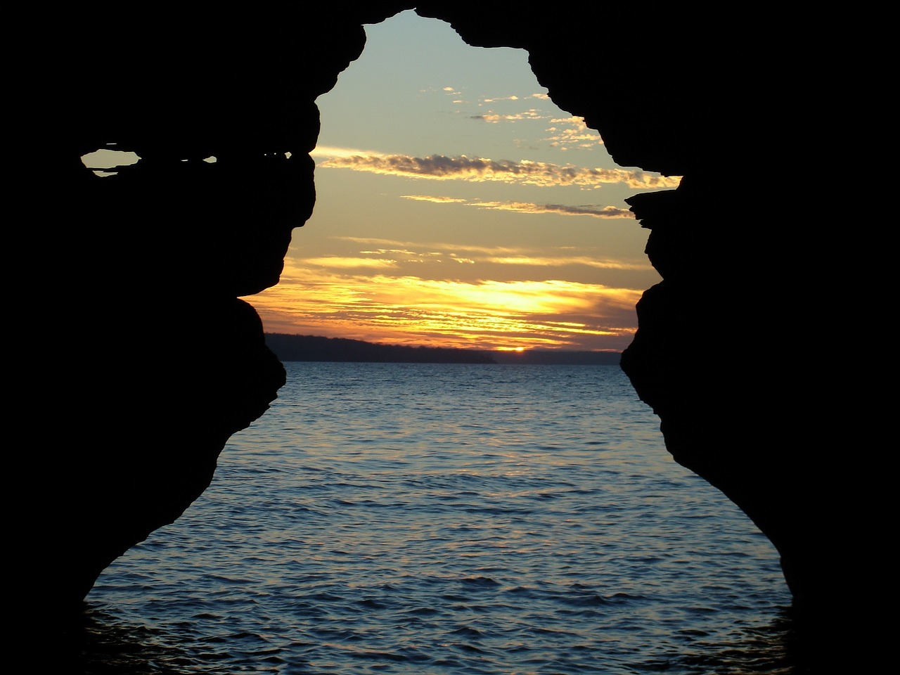 Image - sunset cave opening apostle islands