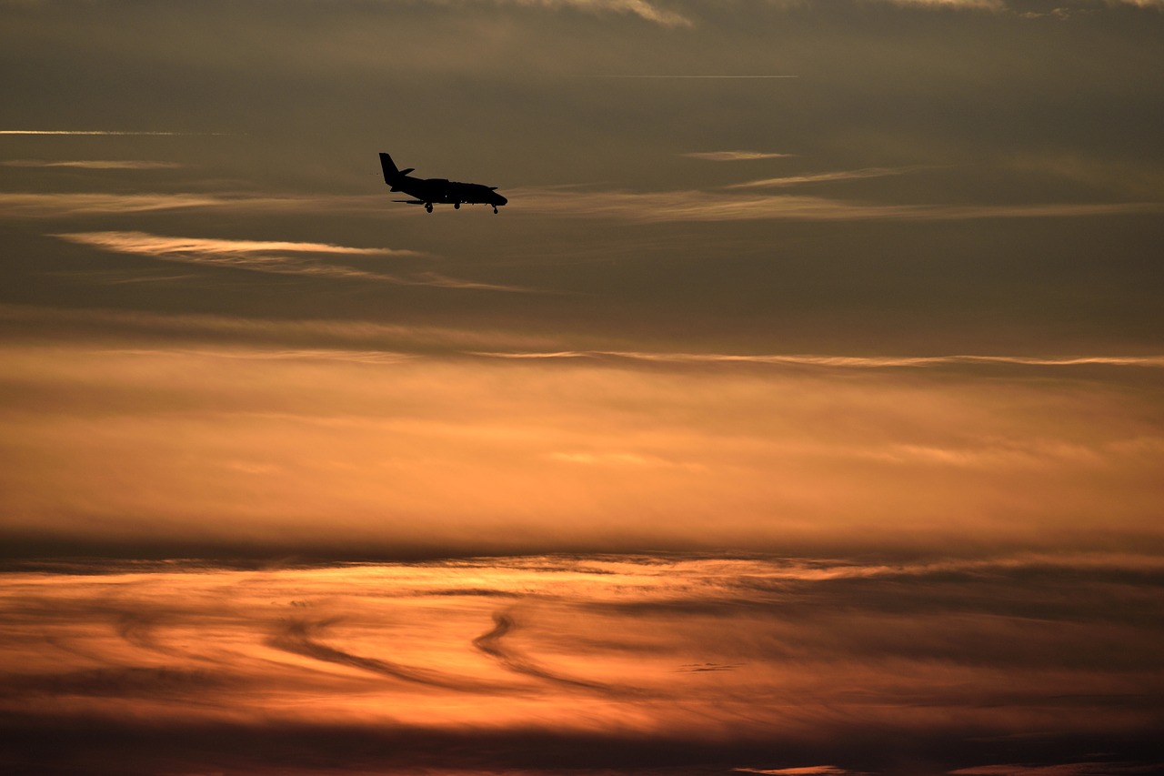 Image - sunset orange sky airplane sun