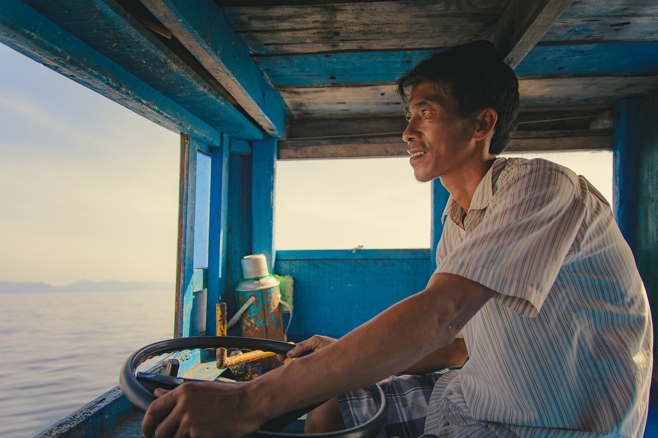 Image - man men boat fisherman driving