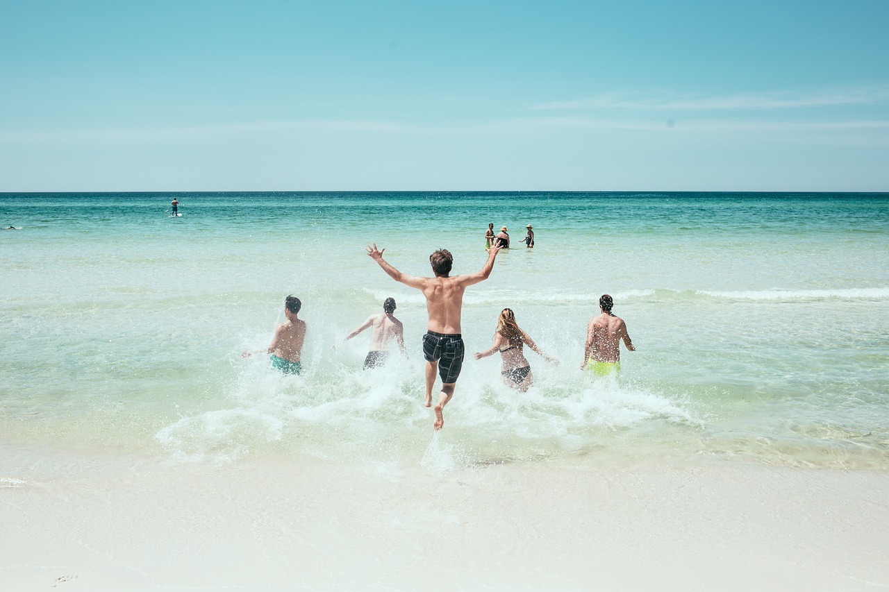 Image - beach ocean people running sea