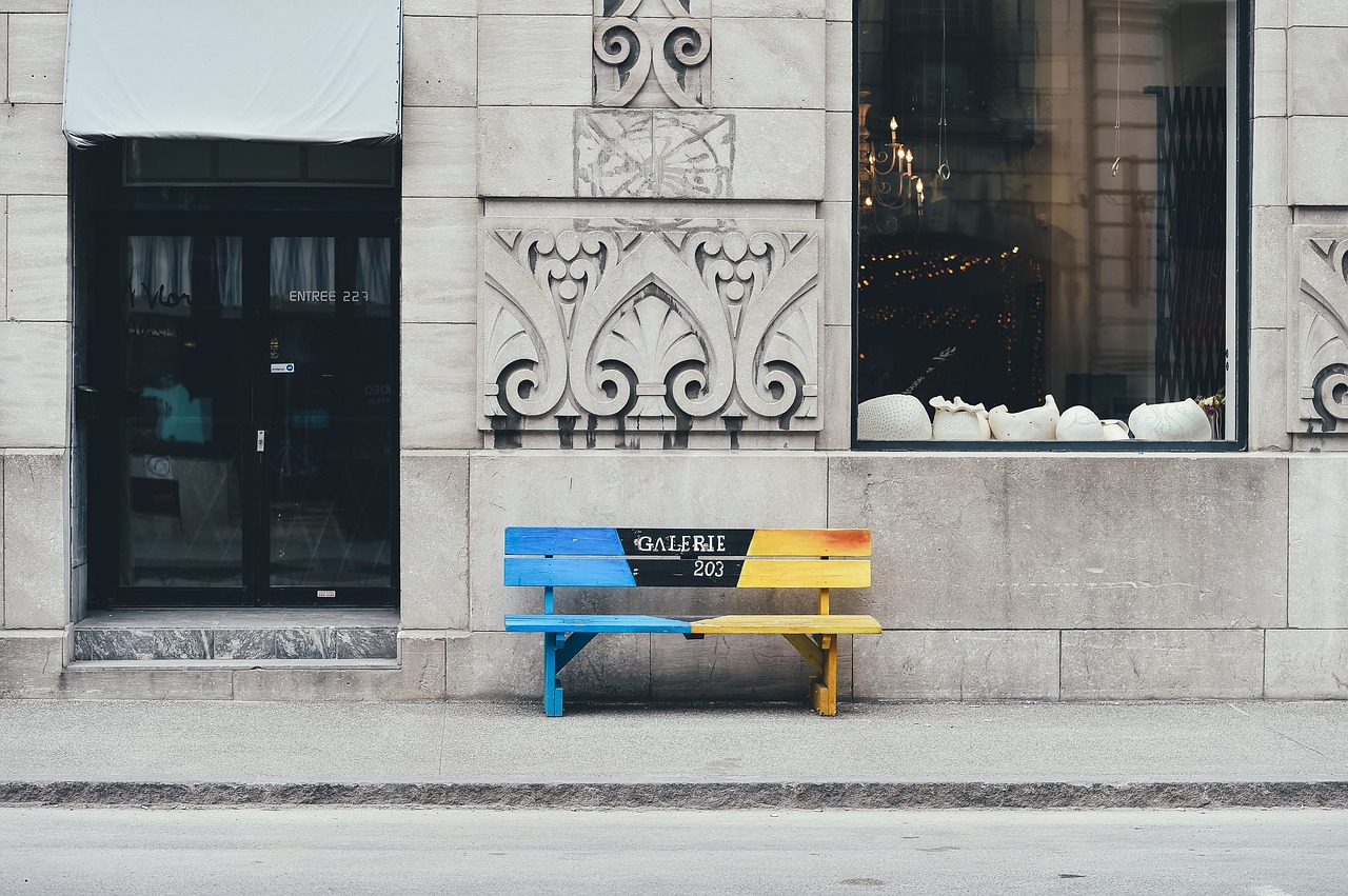 Image - bench building pavement street