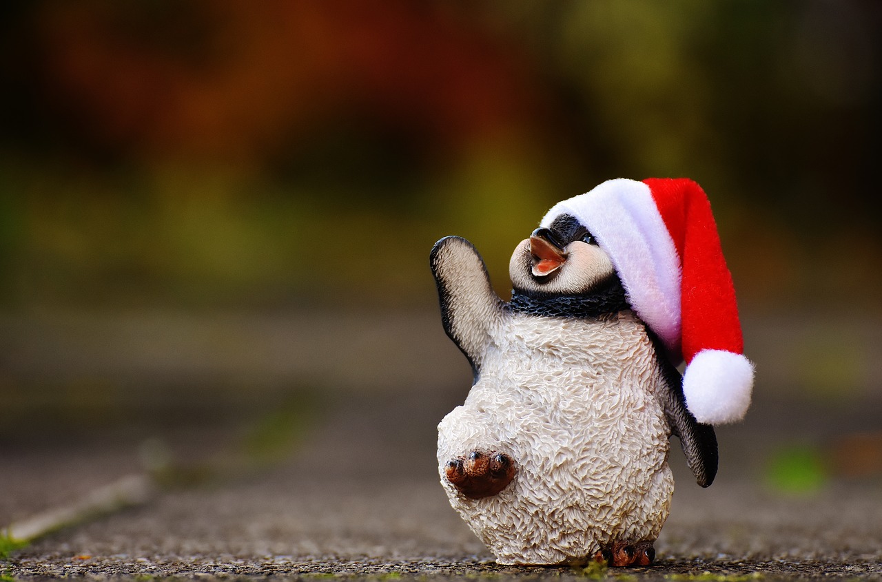 Image - penguin figure christmas santa hat