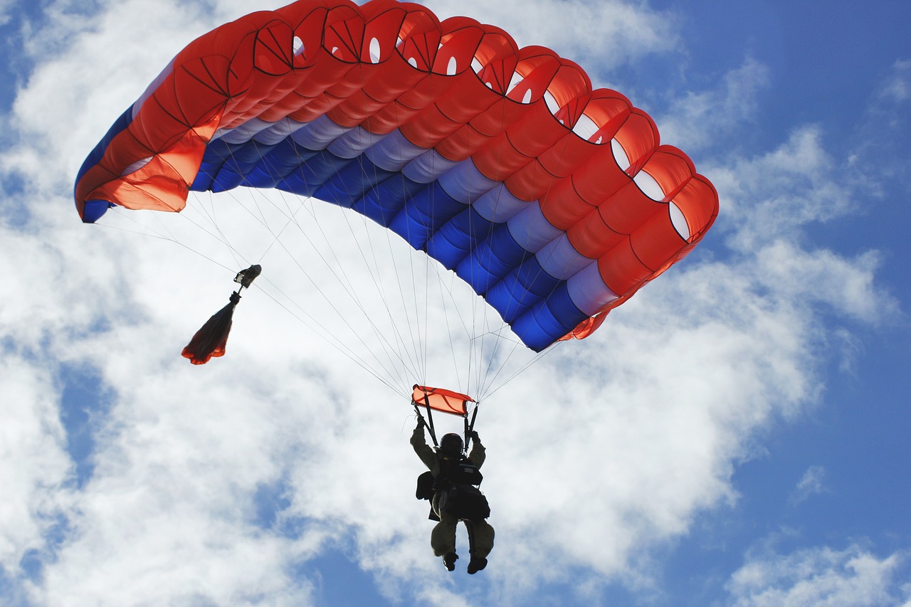 Image - firefighter jumping parachute