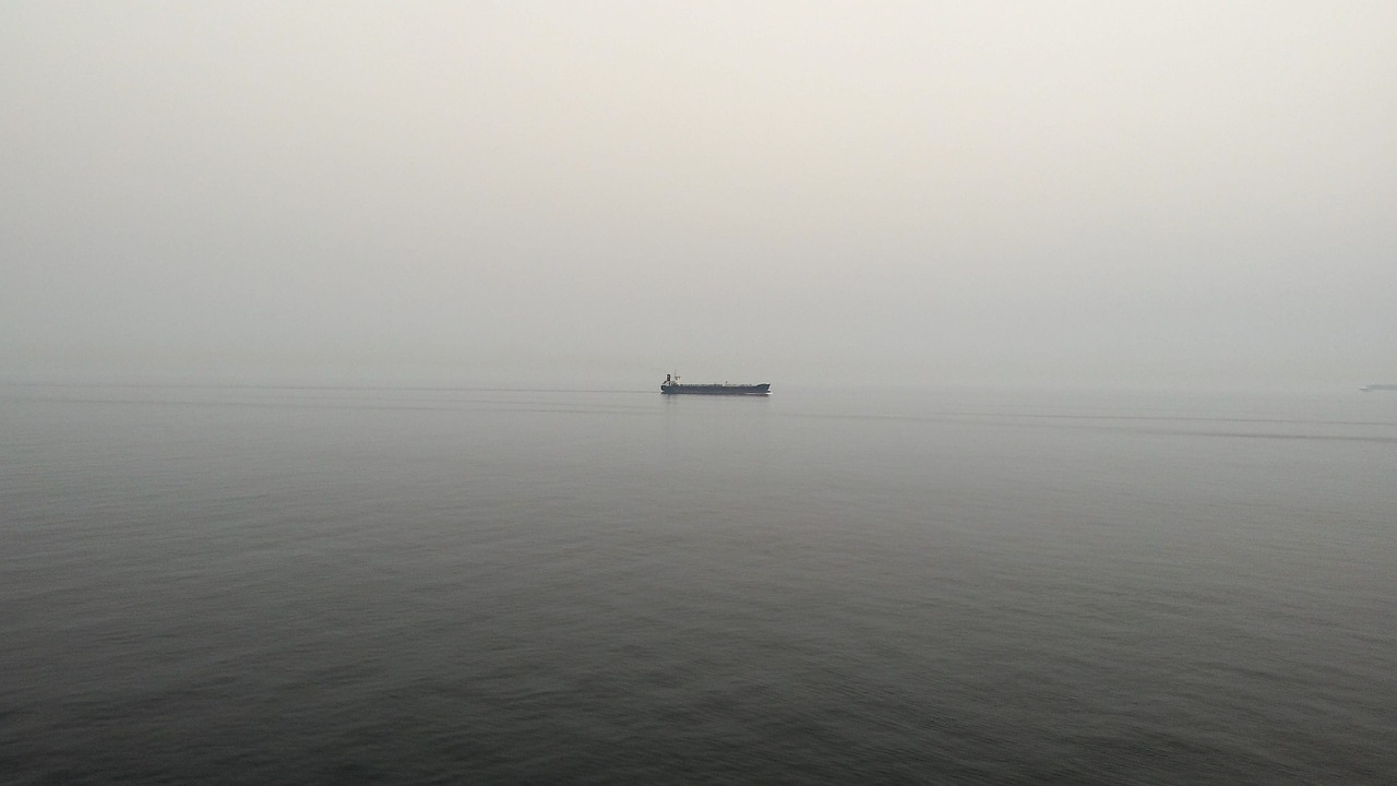 Image - boat fisherman foggy mist ocean