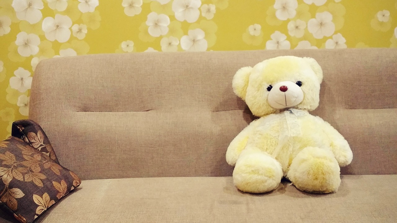 Image - baby toy brown cushion