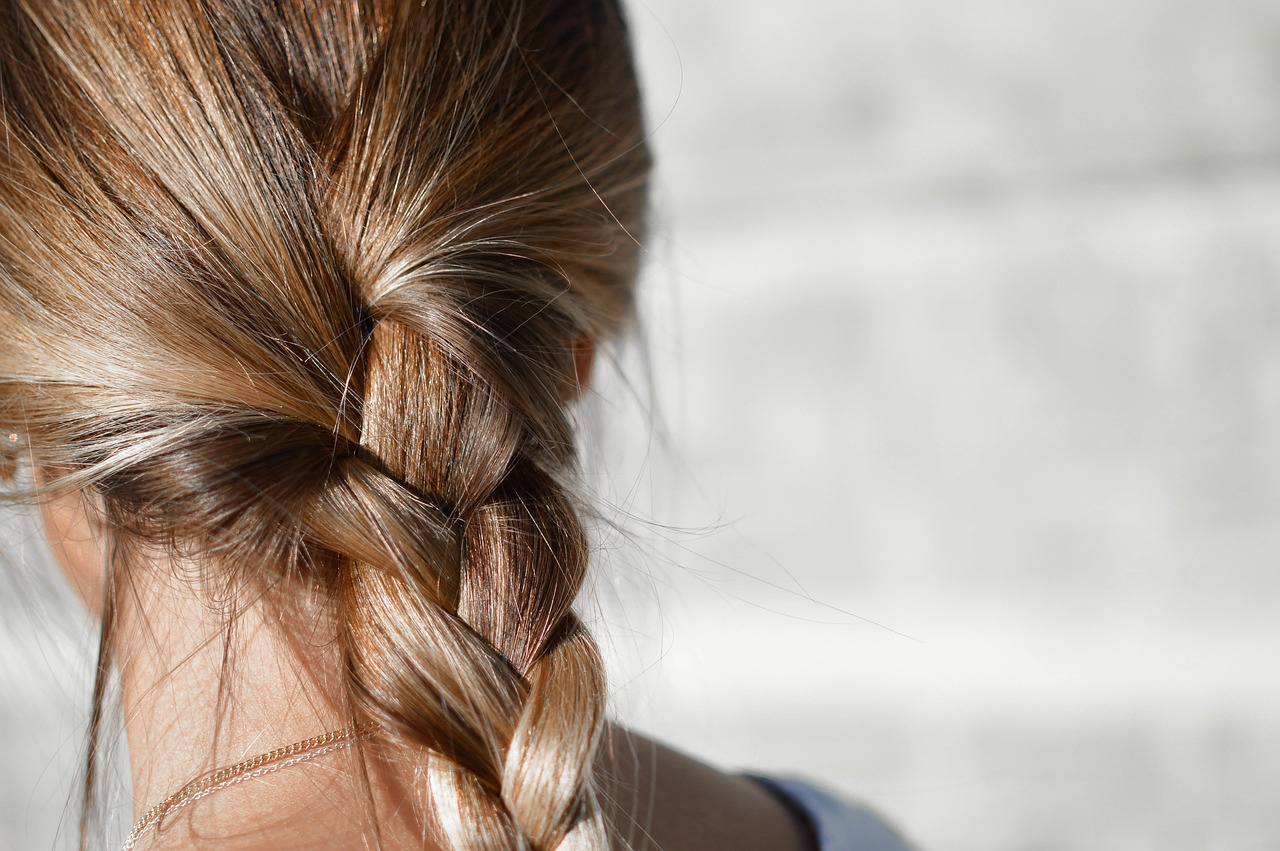 Image - blur braided hair brunette close up