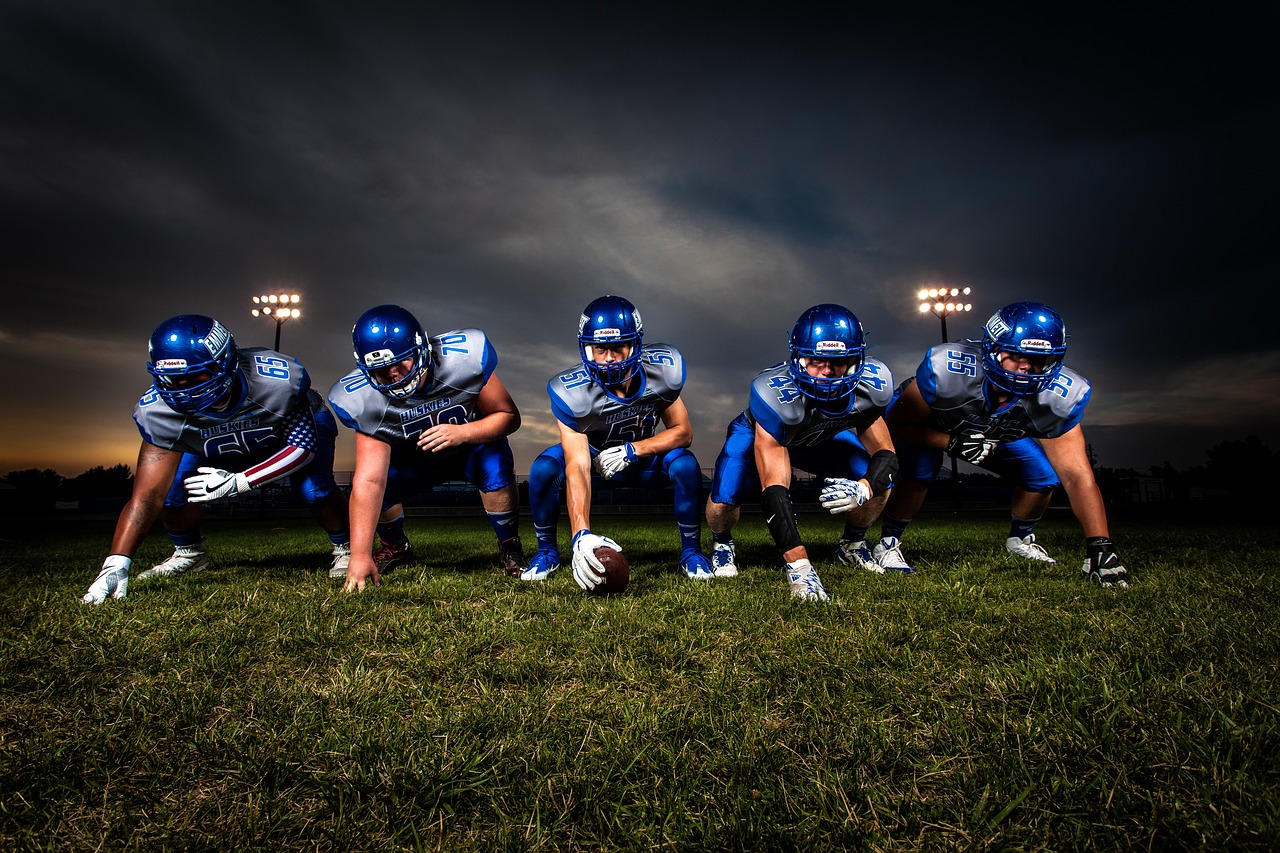 Image - athletes ball field football