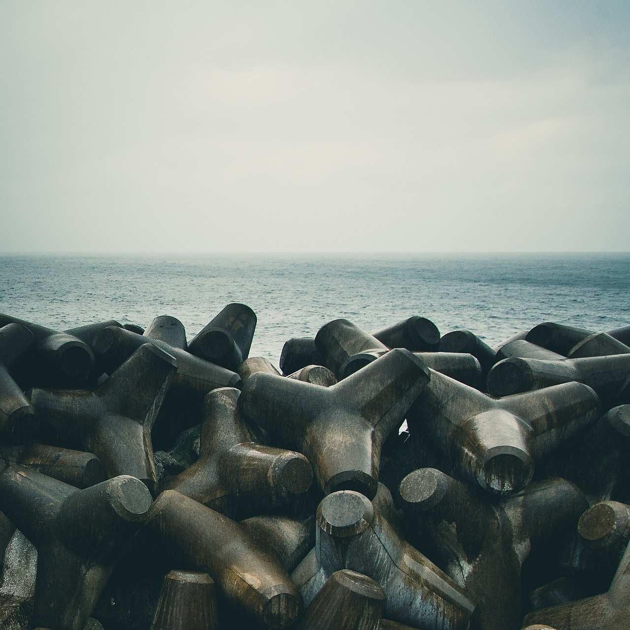 Image - breakwater ocean rocks sand sea