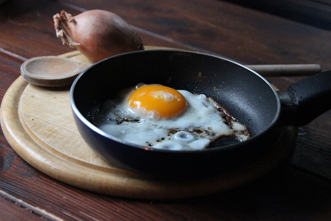 Image - fried frying pan breakfast egg yolk