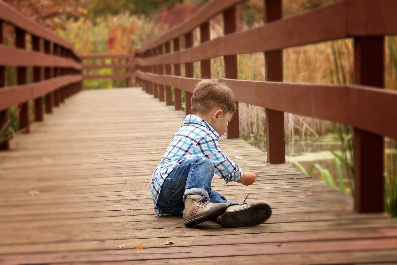 Image - boy fishing fall bridge portrait