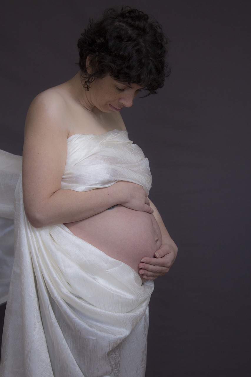 Image - woman pregnancy belly speaker