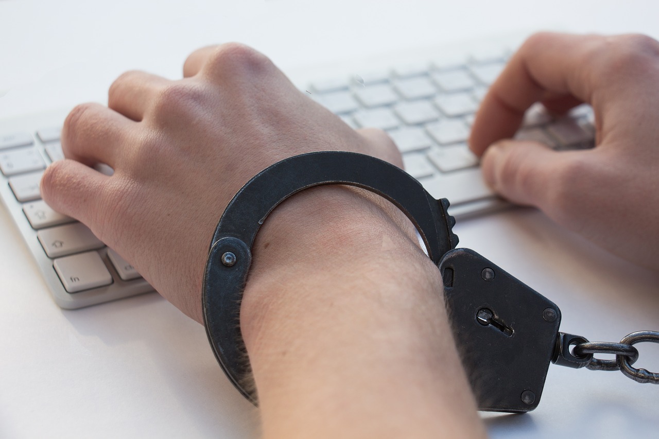 Image - igromania game addiction handcuffs