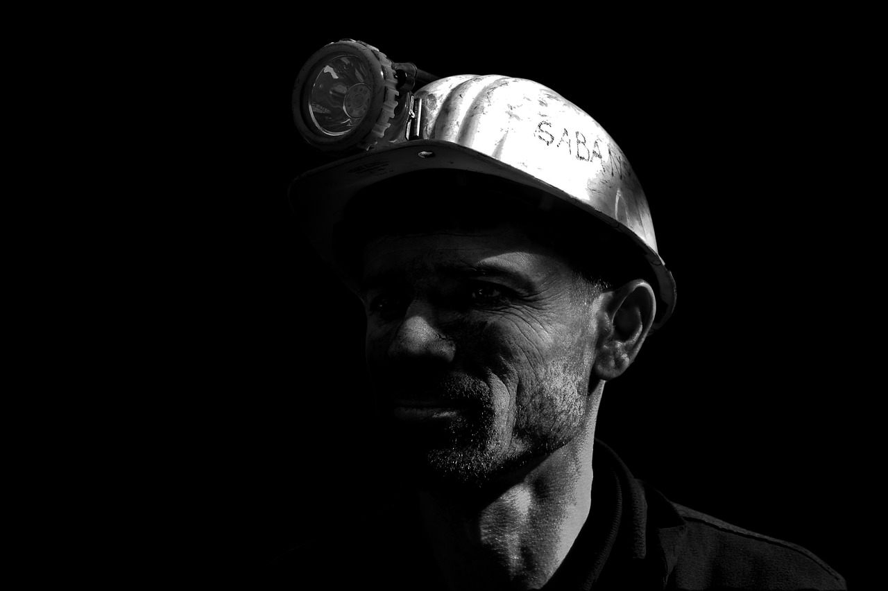 Image - miner helmets black white portrait