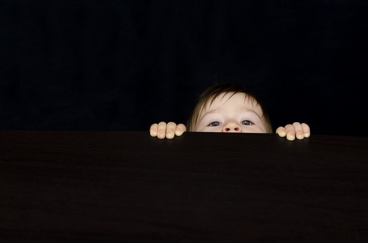 Image - curiosity baby boy desk face