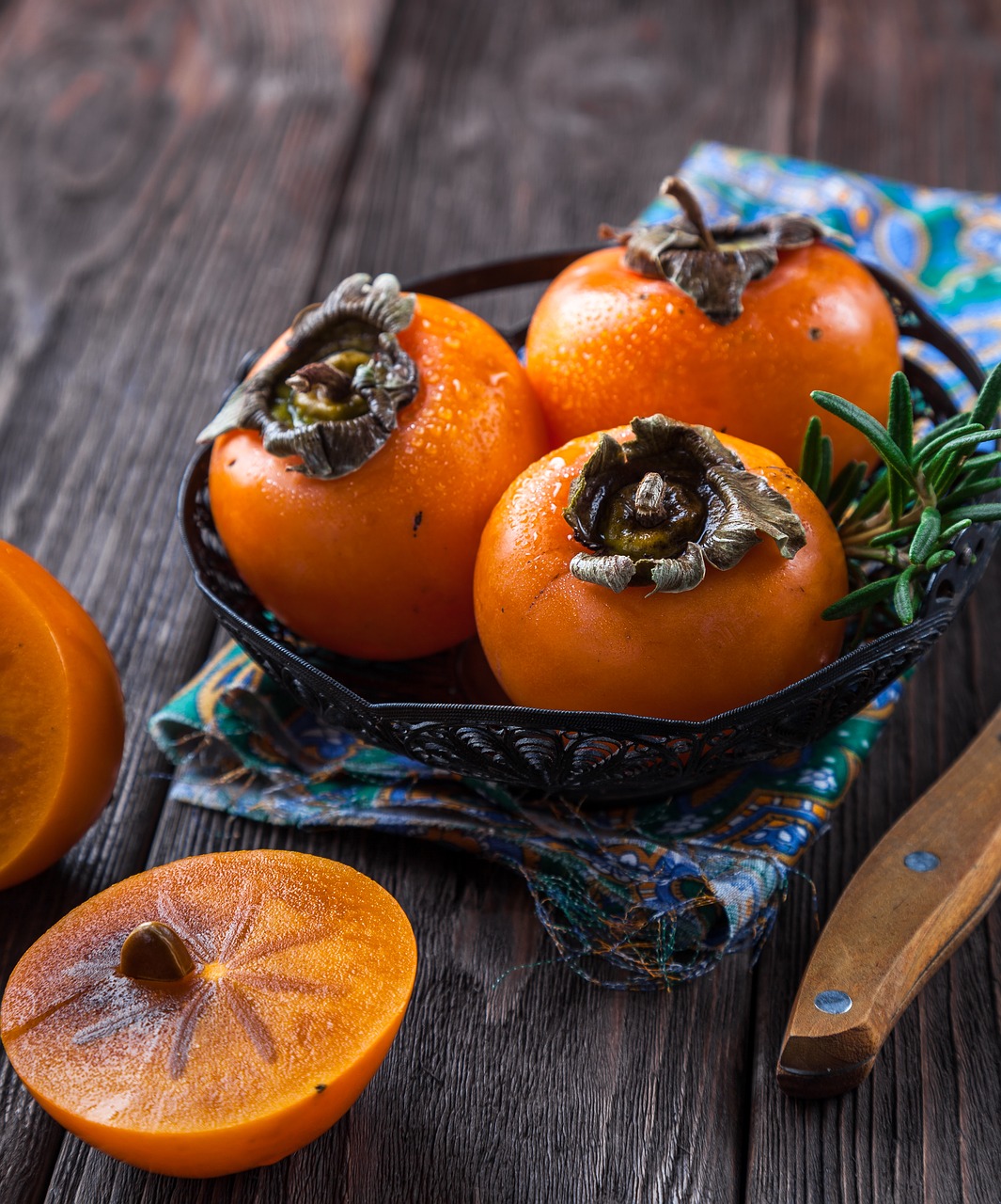 Image - persimmon fruit orange table