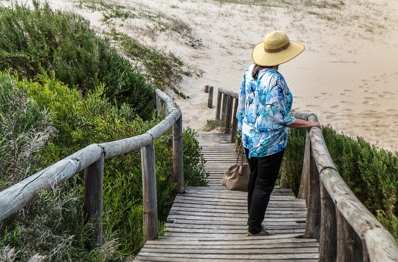 Image - woman alone lonely walkway beach