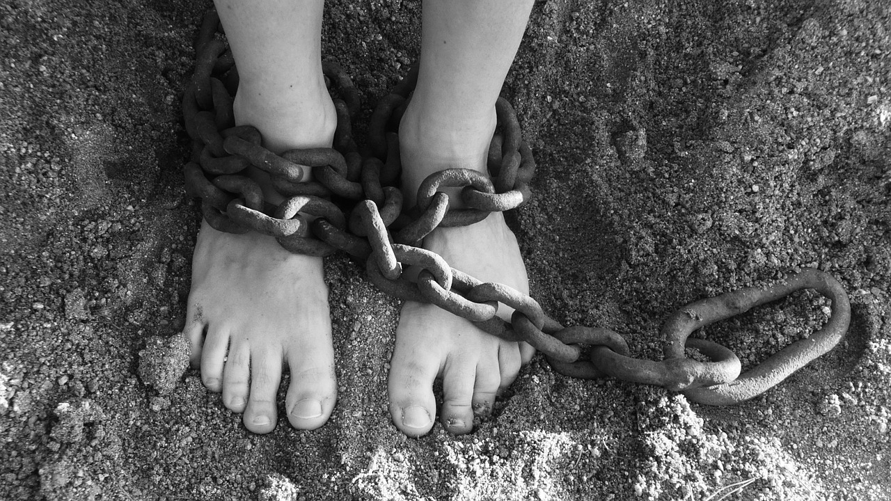 Image - chains feet sand bondage prison