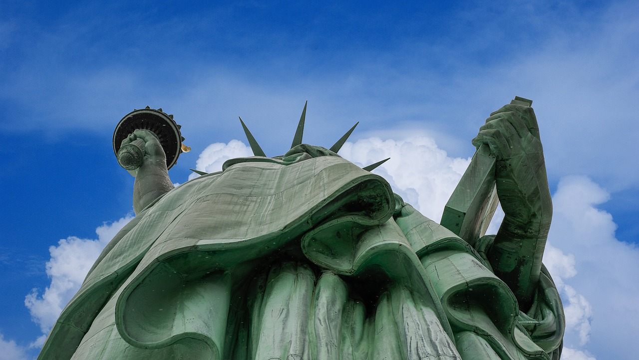 Image - statue of liberty clouds