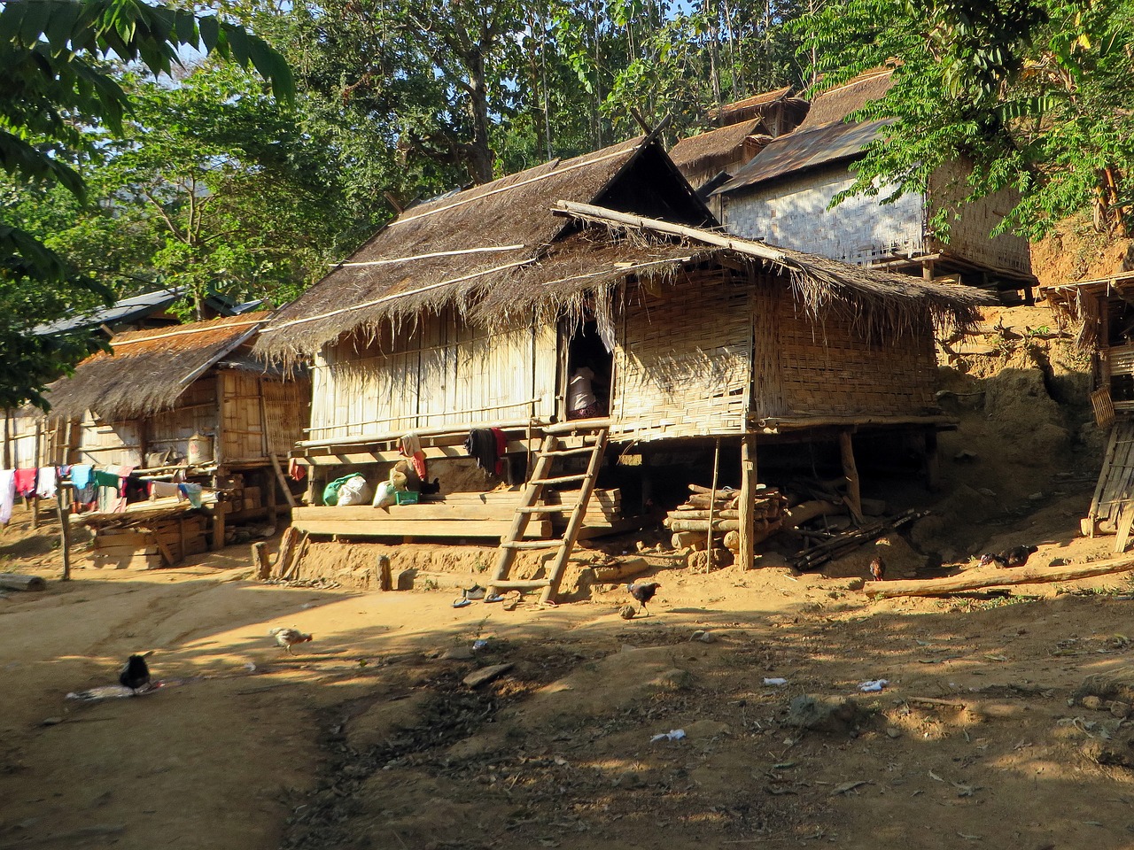 Image - laos village houses kamu ethnicity