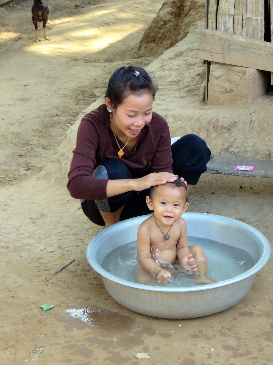 Image - laos village ethnic lao baby bath