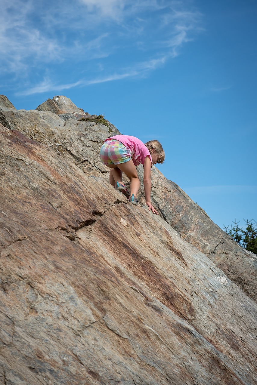 Image - child girl climb stone rock