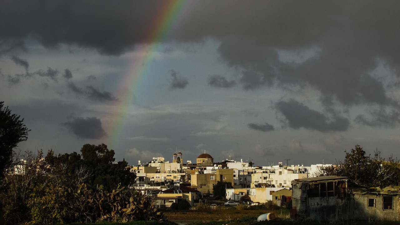 Image - rainbow storm town sky clouds