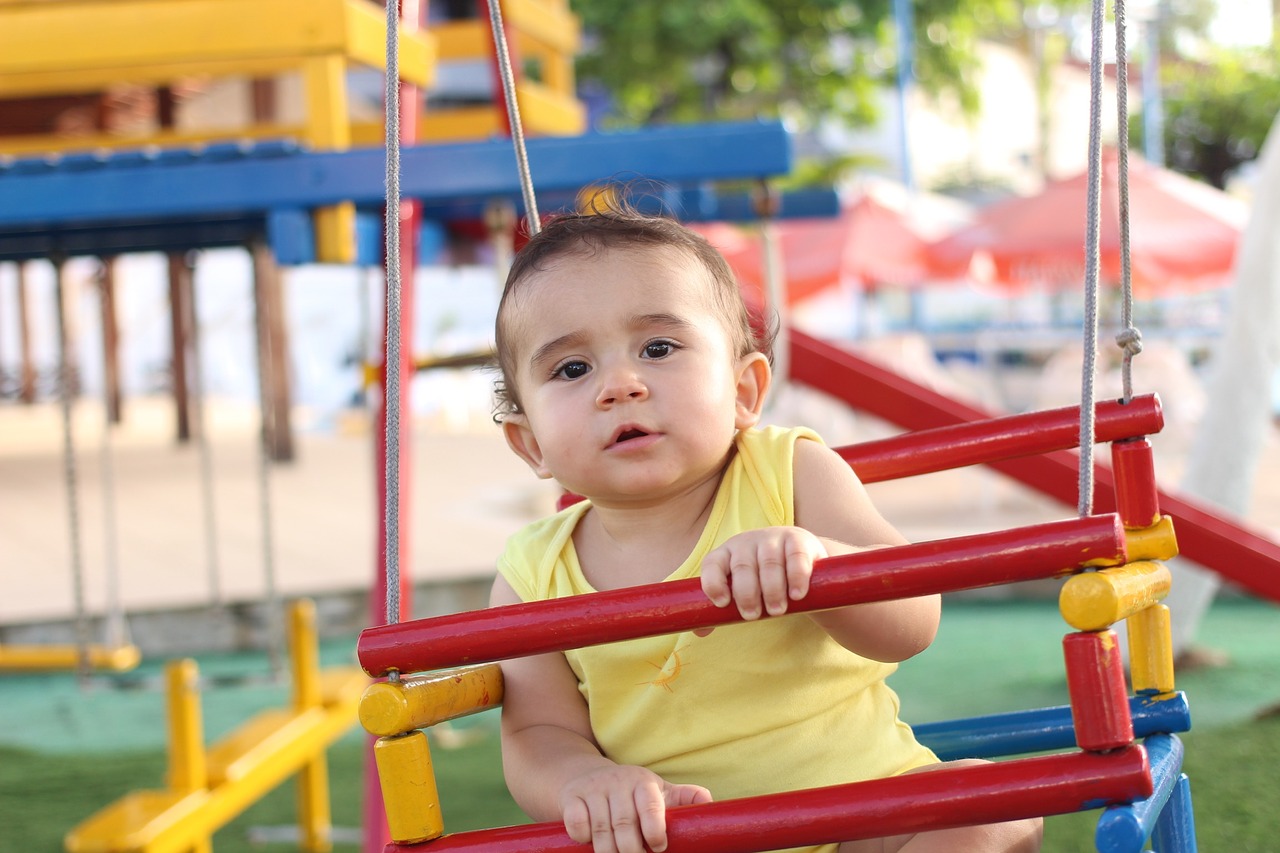 Image - baby playing park playing ground