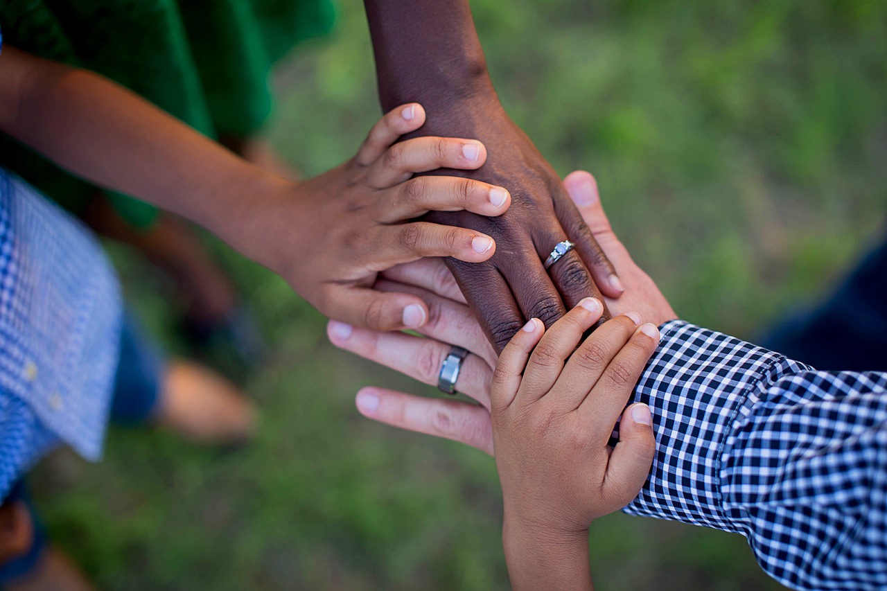 Image - hands life swirl interracial family