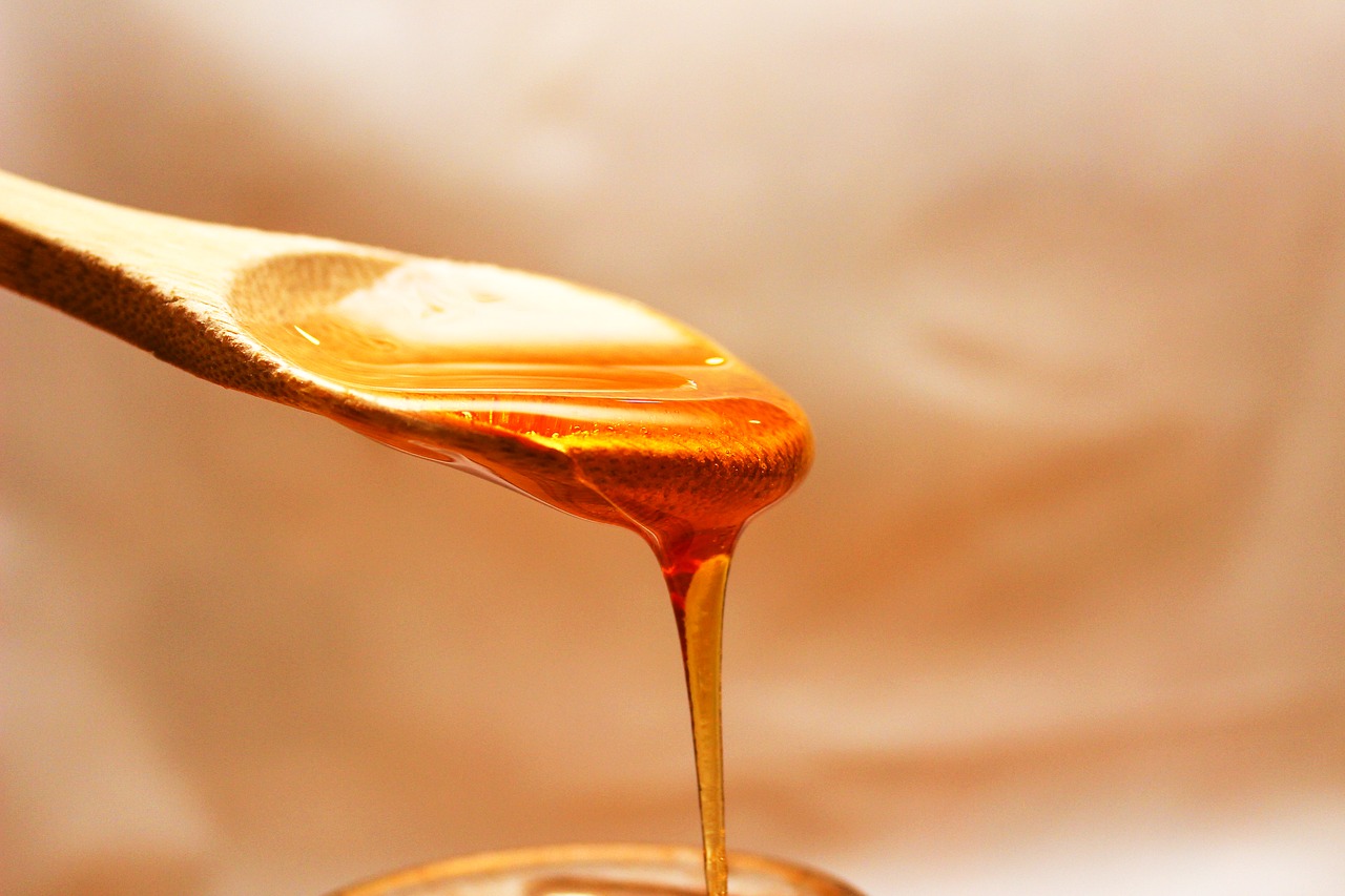 Image - honey flowing spoon doré liquid