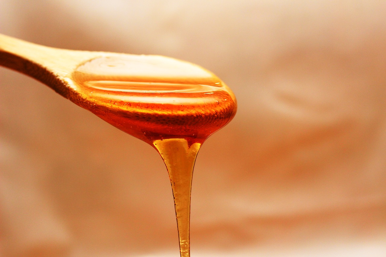 Image - honey flowing spoon doré liquid