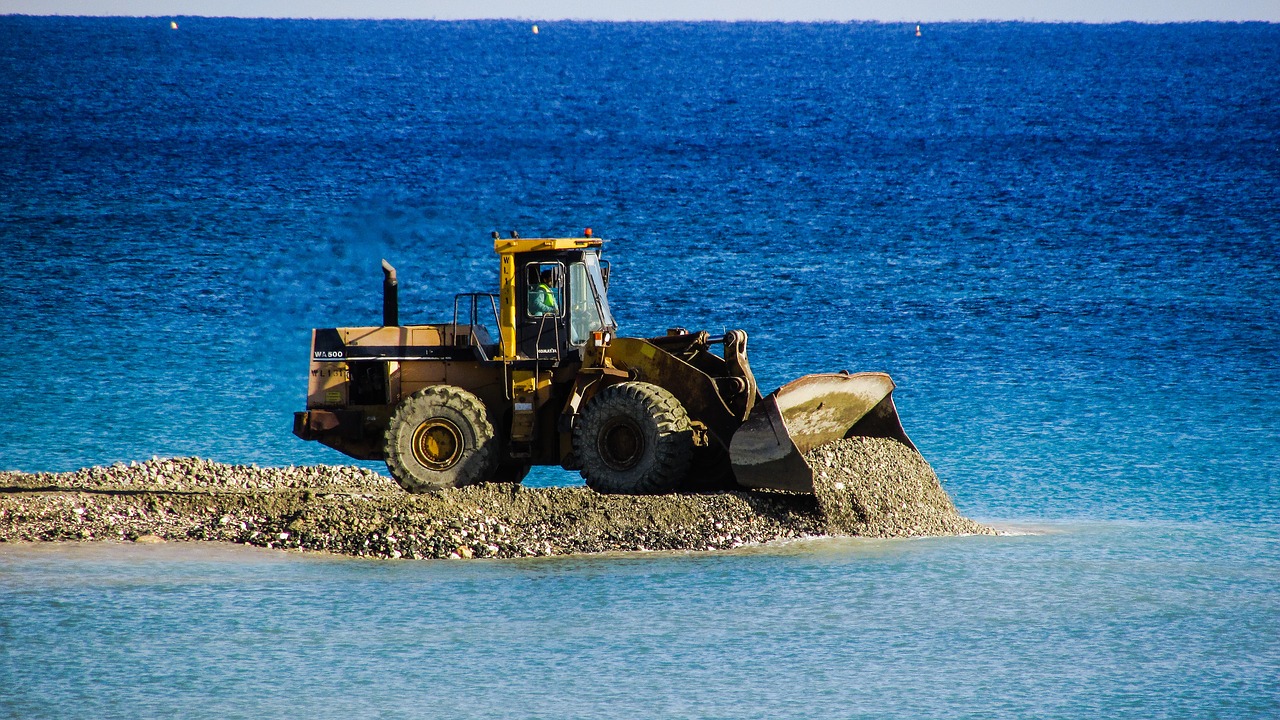 Image - bulldozer unload gravel