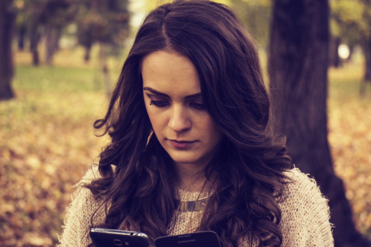 Image - girl looking at phone girl portrait