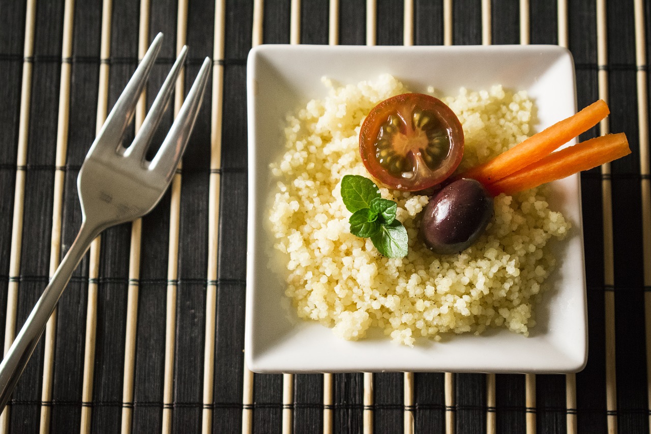 Image - cuscus tomato olive carrot fork