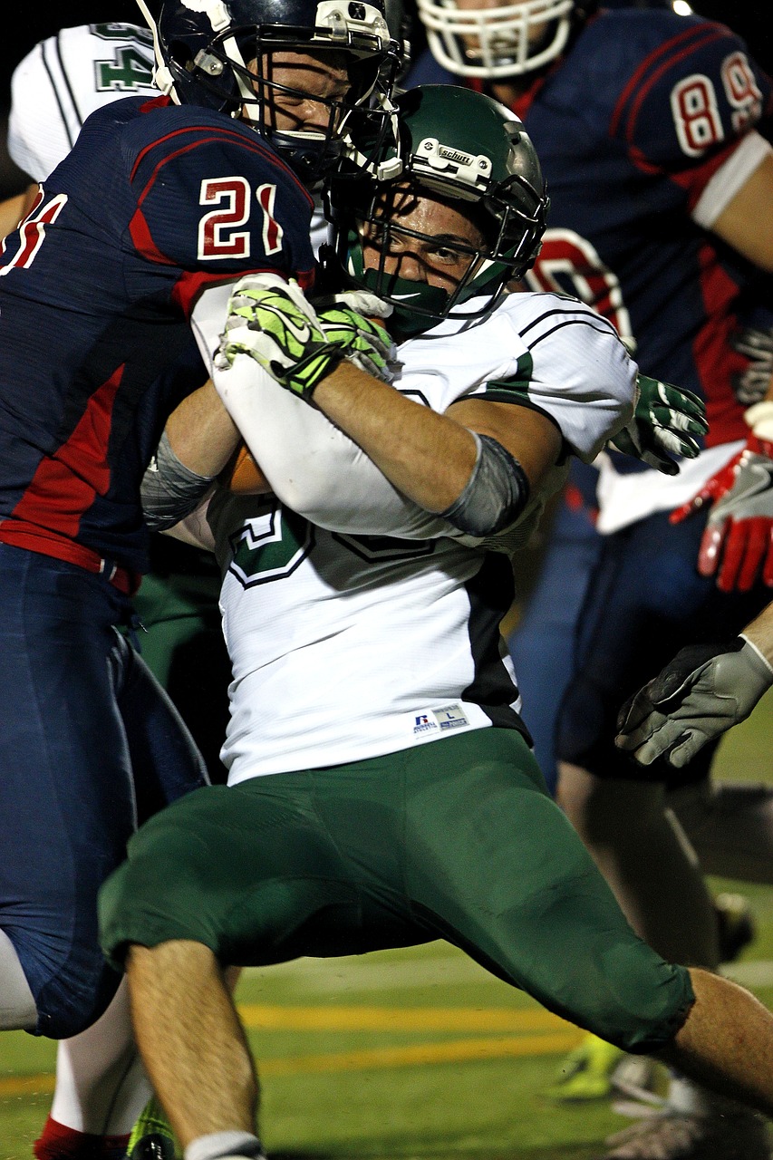 Image - football player aggression tackle