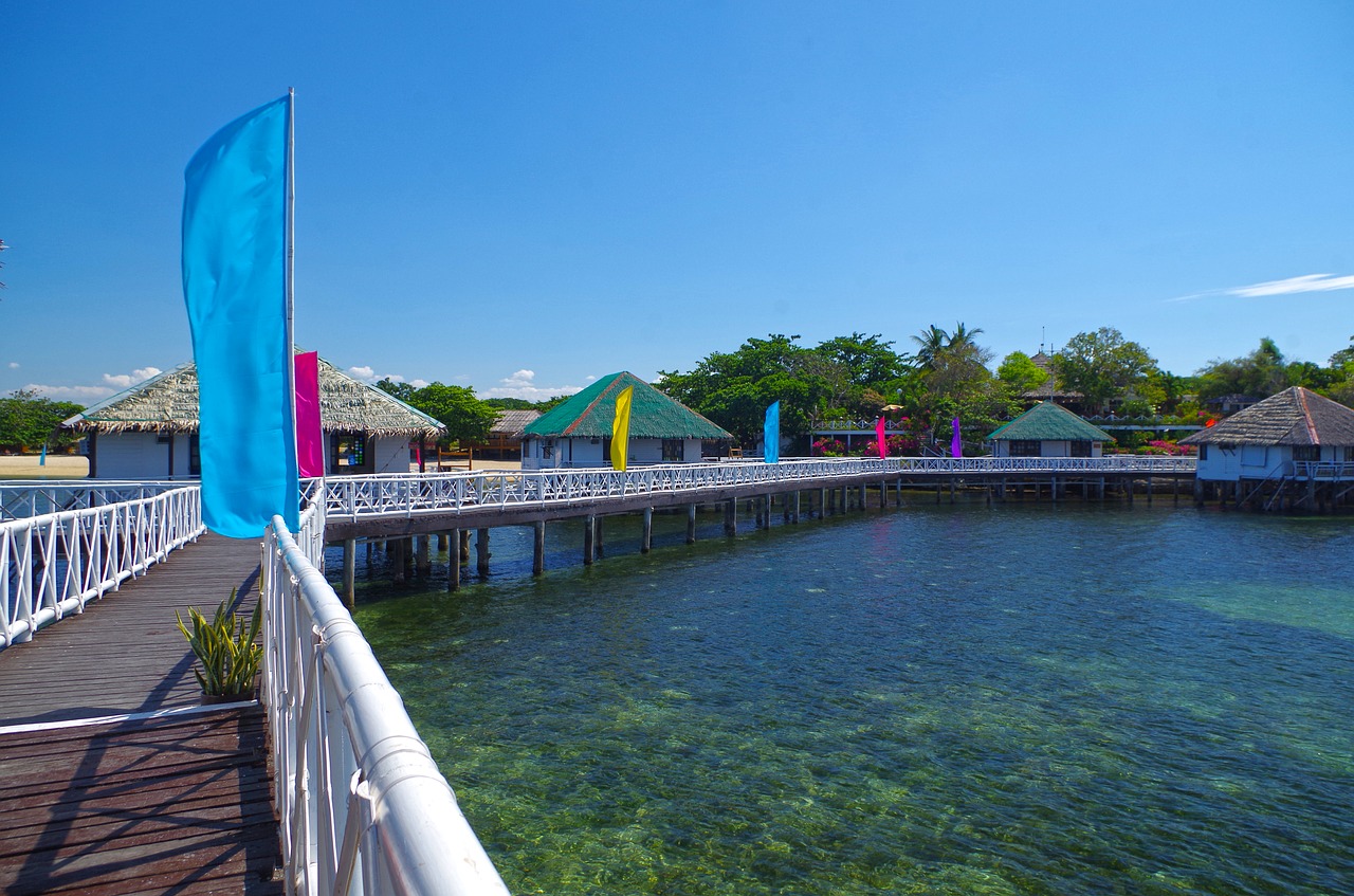 Image - sea footbridge cottages