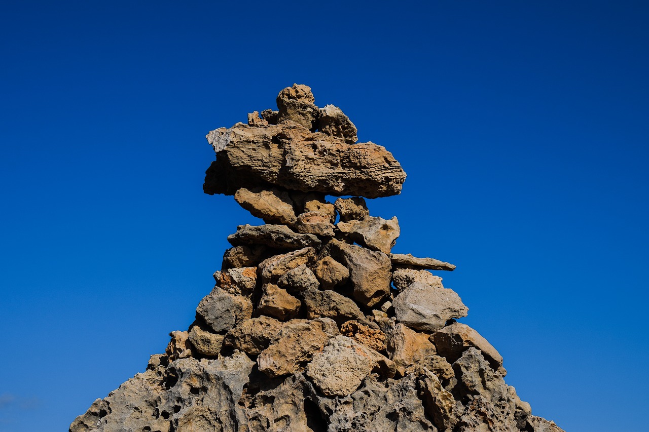 Image - cairn stones stack rocks sign