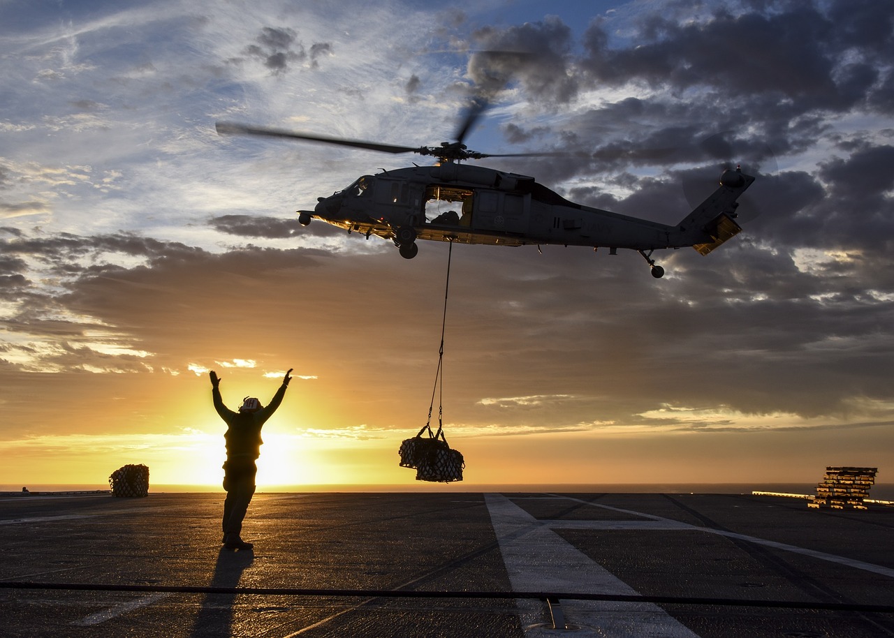 Image - helicopter sunrise sea hawk