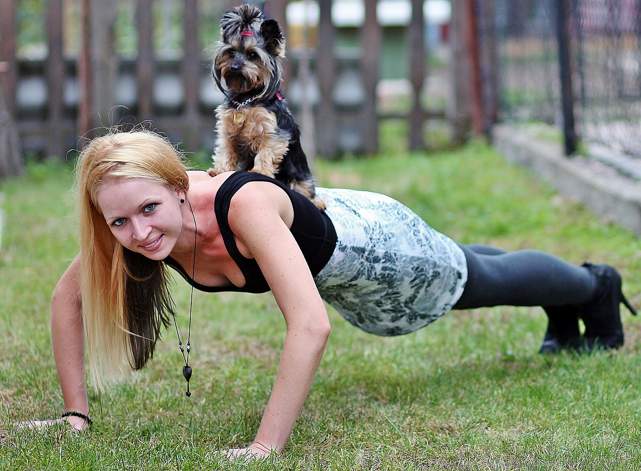 Image - blonde woman yorkie dog workout