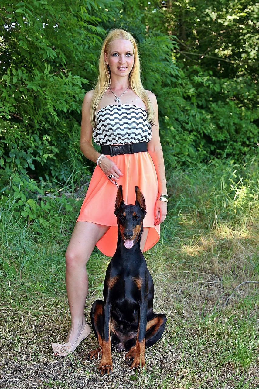 Image - blonde woman doberman dogs pretty