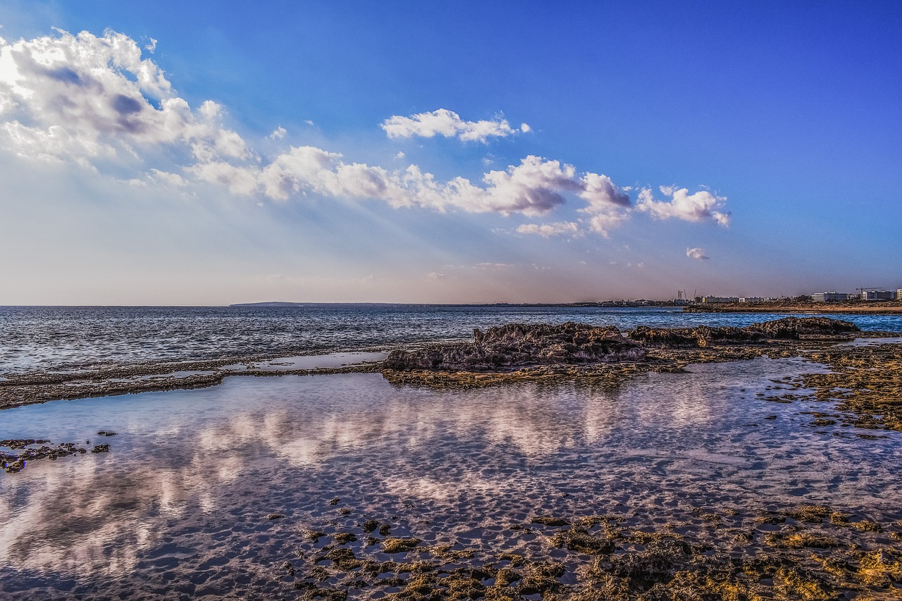 Image - rocky coast sea reflections sky