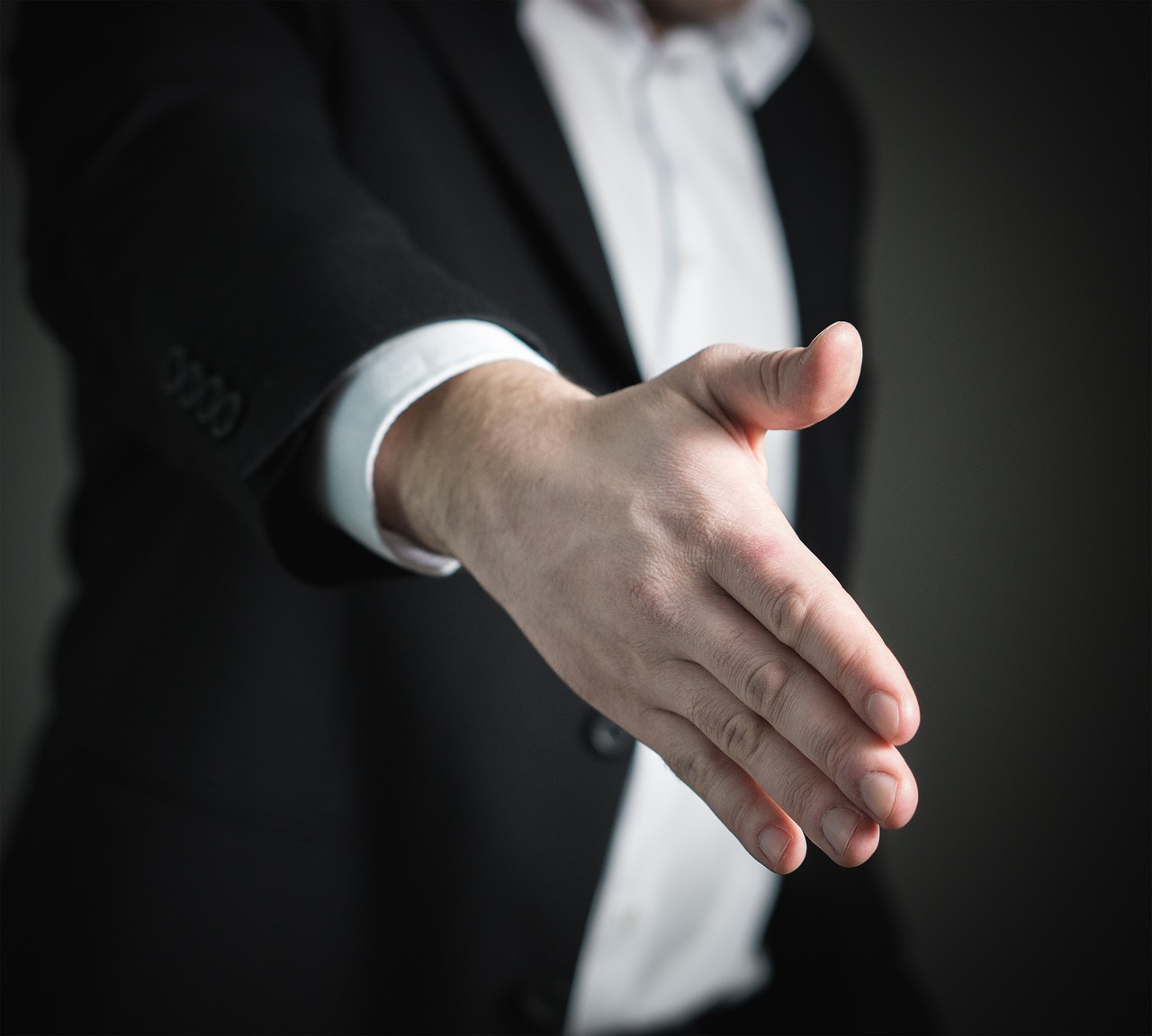 Image - handshake hand give business man